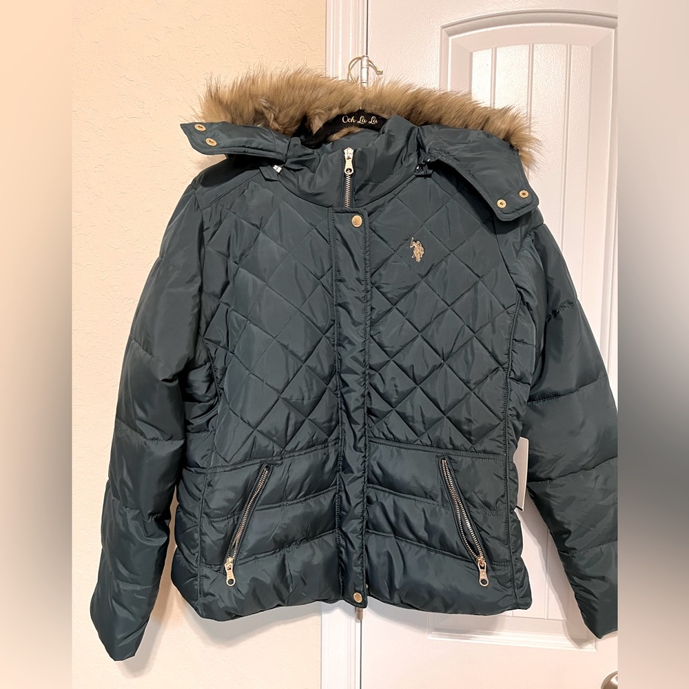 U.S Polo women puffer jacket with gold hardware.